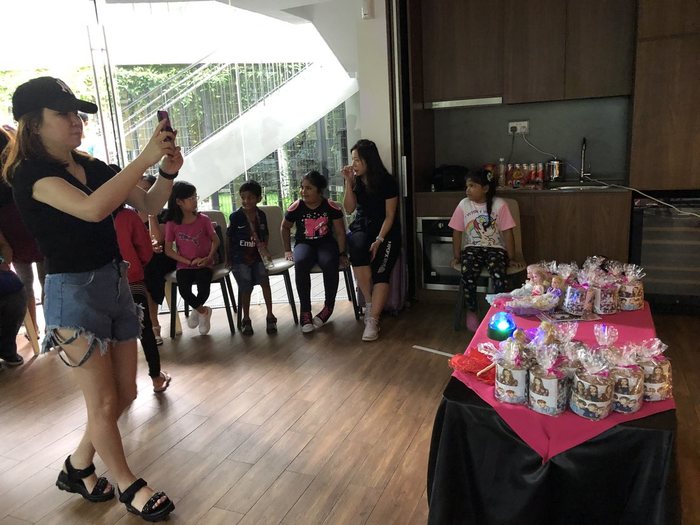 Party under way with guests and children seated